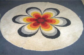 Berber mit auffälligen Blumenmsuter nach Teppichwäsche